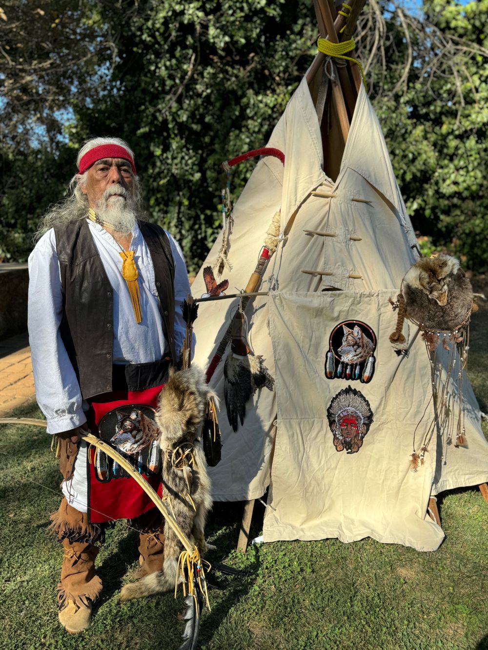 Pena Adobe Historical Society Docent Armando Perez with a teepee used by the Plains Indians